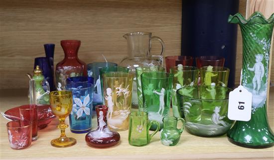 A collection of Mary Gregory style coloured enamelled glassware,